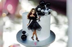 Girl in black dress cake